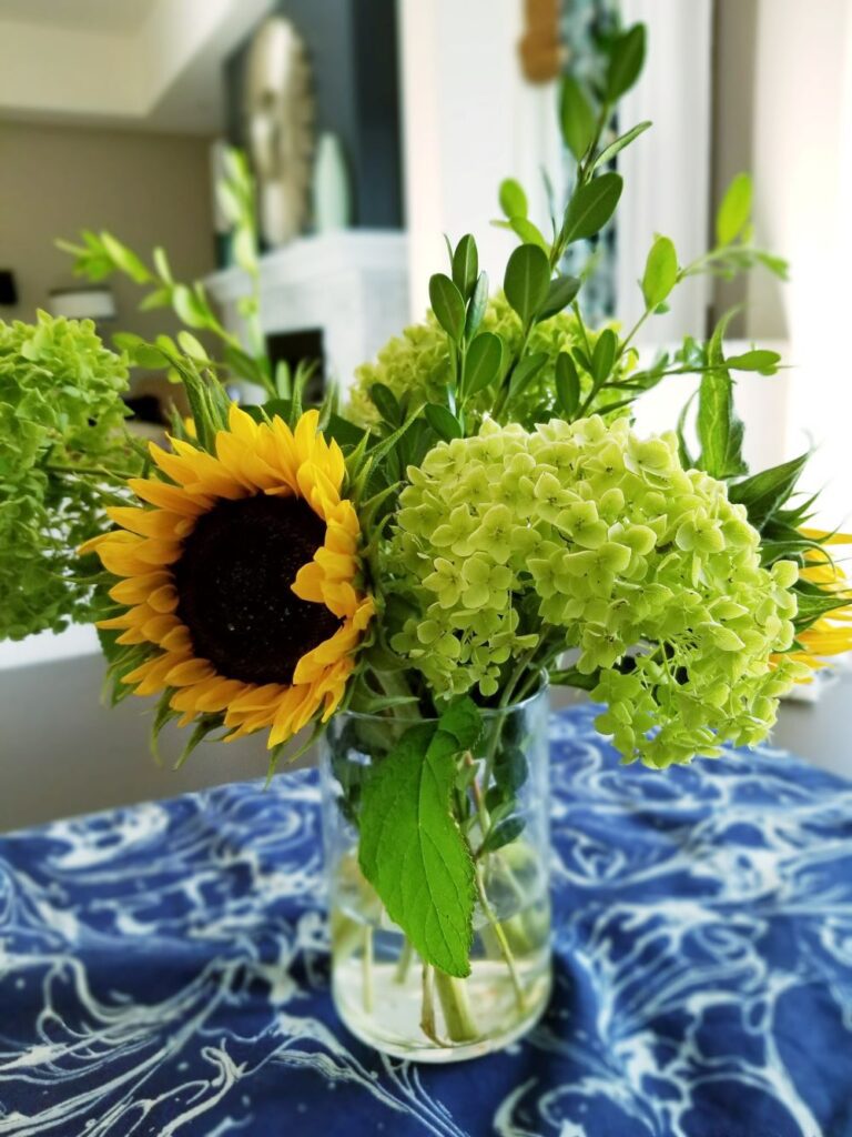 green dry hydrangea and sunflower