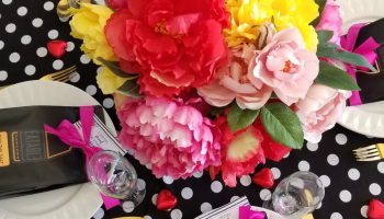 black and white polka dot with bright floral centrepiece galentines day 