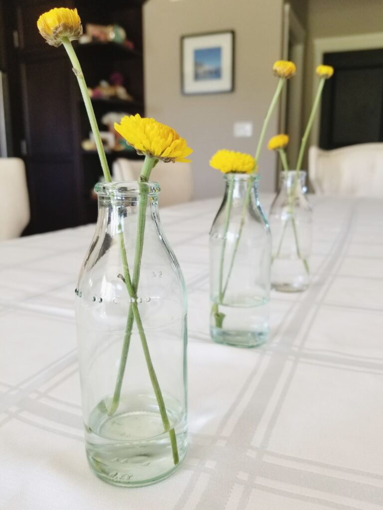 grocery store flowers arranged on Thanksgiving table