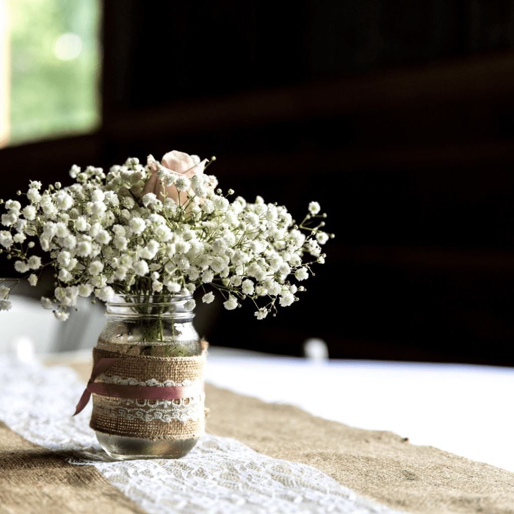 lace runner and baby's breath arrangement trends 2023